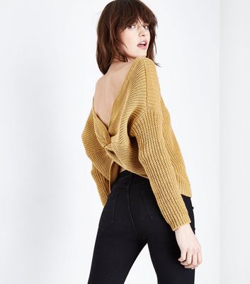 QED Pull jaune torsadé au dos j1m7meSX QED Pull jaune torsadé au dos j1m7meSX